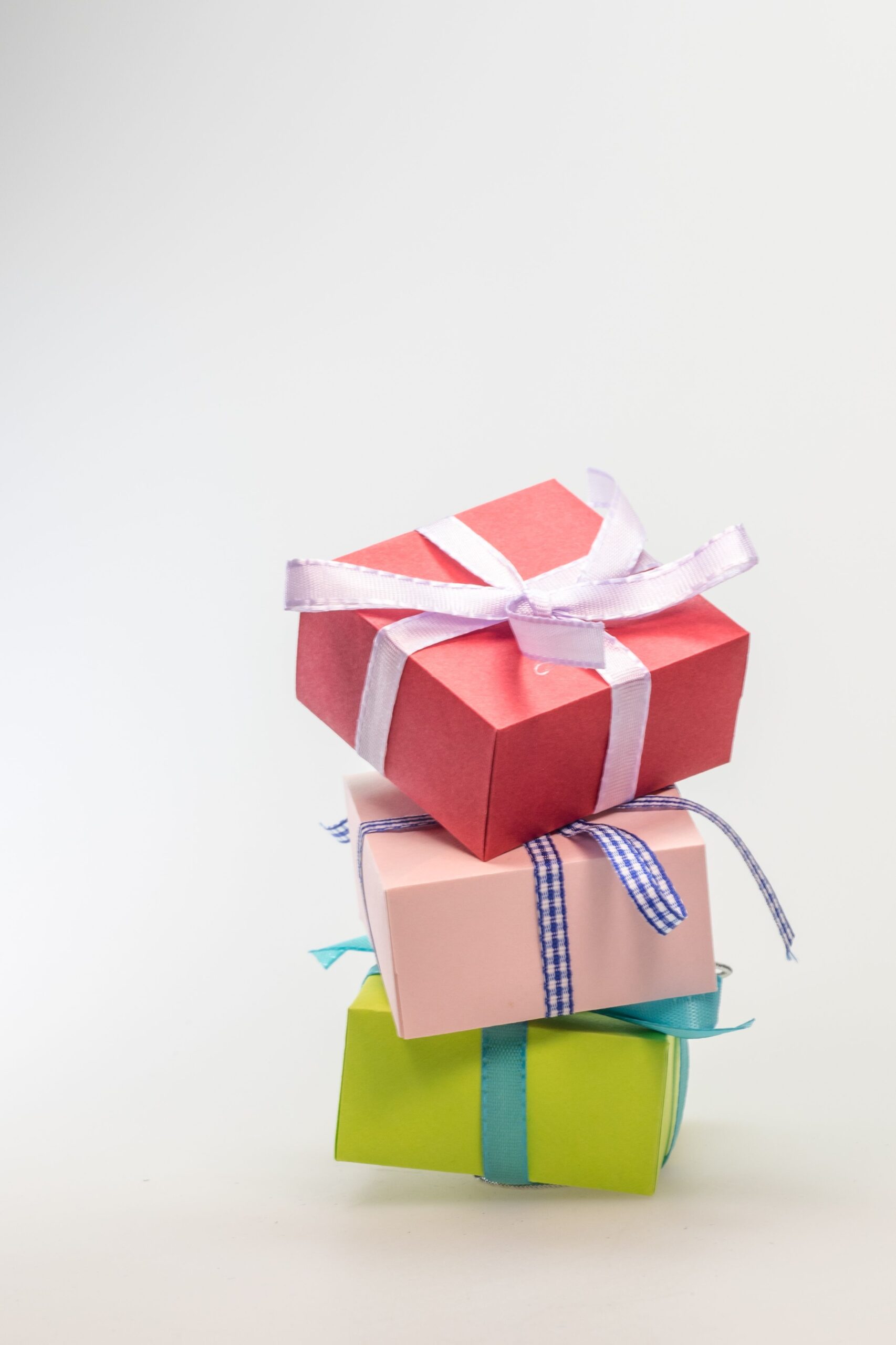 A stack of different colored boxes, representing the different types of CPA offers such as pin-submit, email-submit, and free trial