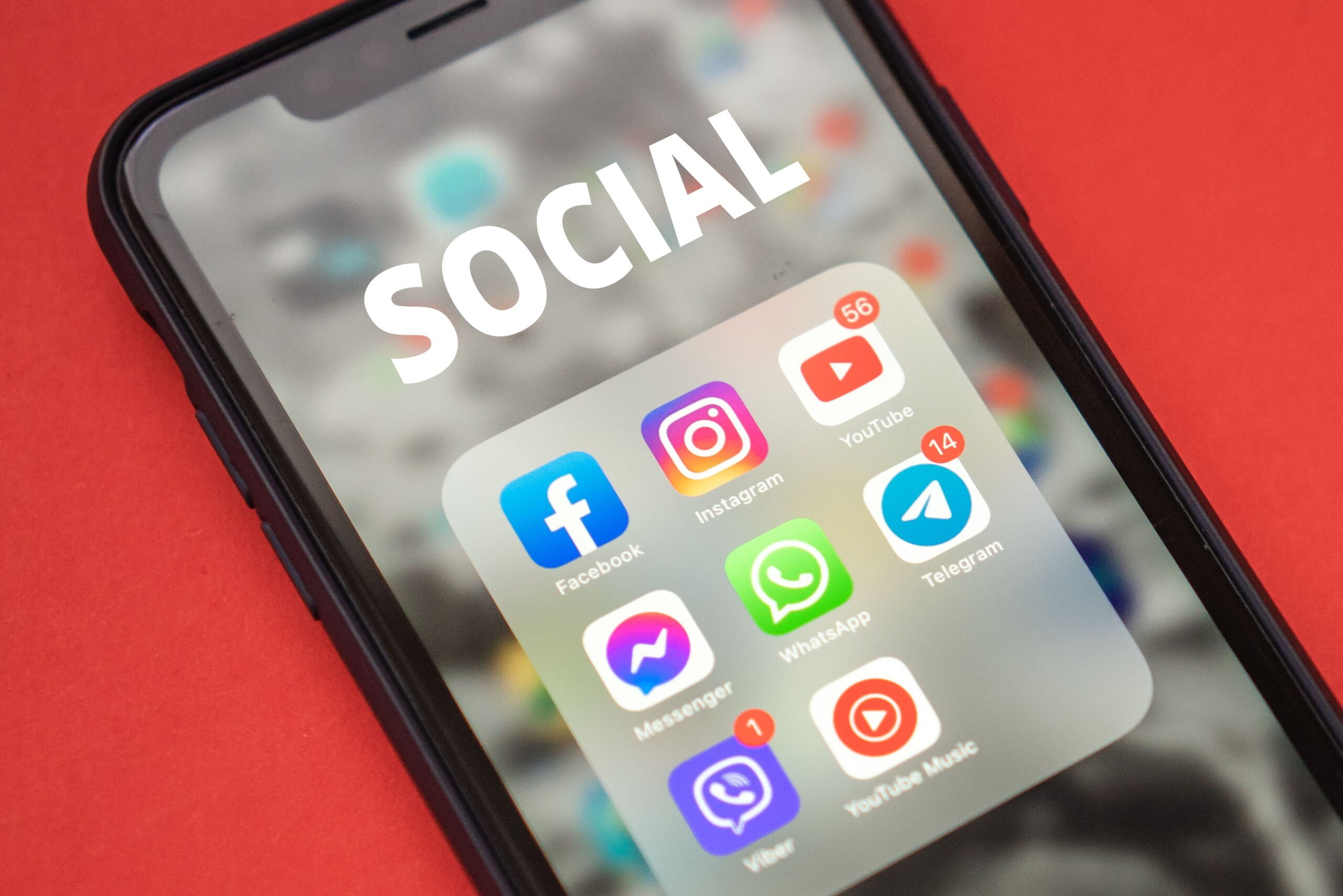 Illustrative close-up of app icons on a phone, representing a fake or cloned crypto exchange app
