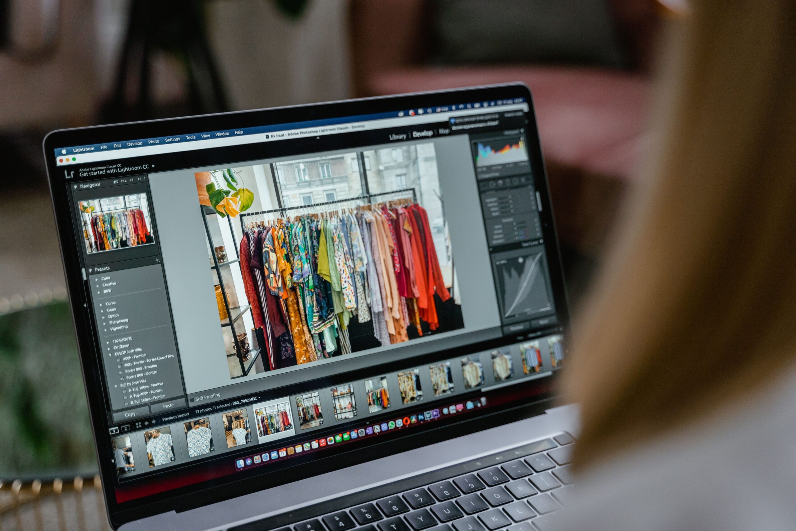 Illustrative photo of photo editing software on a laptop screen, representing fabricated income screenshots
