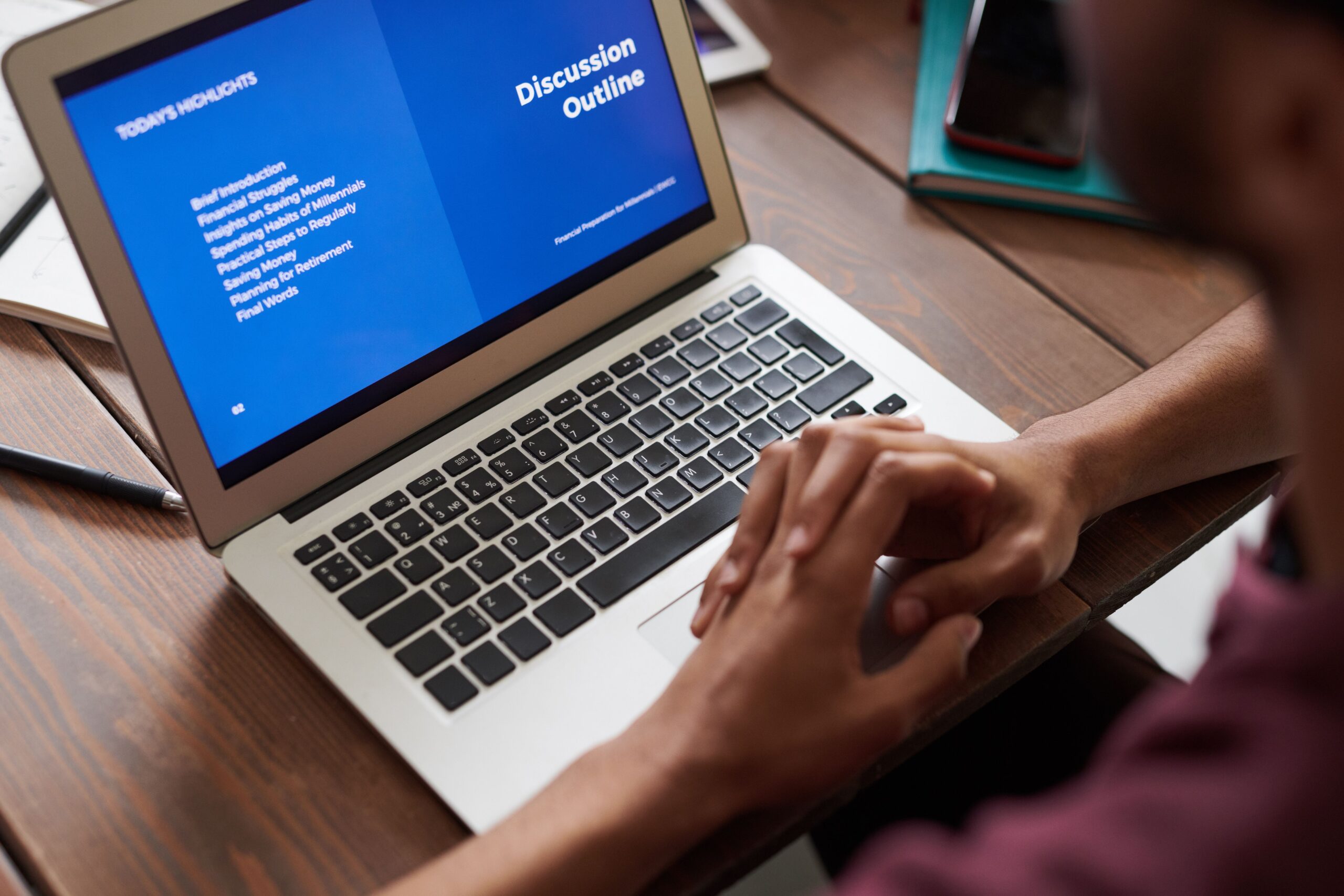 Illustrative photo of a person watching a presentation on a laptop, representing a webinar sales funnel